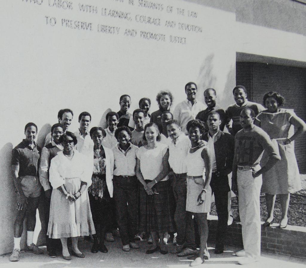 BLSA members, left to right; Front row: C. Clay, G. Cherenfant, J. Grier, M. Camp, N. Smith, E. Wallace; Second row: M. Turner, P. Randolph, J. Clarkson, P. Mitchell, S. Weston, R. Ramsey, T.J. Hastly, H. Castilla, J. Grudlos; Third row: E. Carlton, B. Russell, C. Redmond, R. Ruffin, P. Davis, L. Warren, P. Lassiter. 1985, Barrister (Law School yearbook).